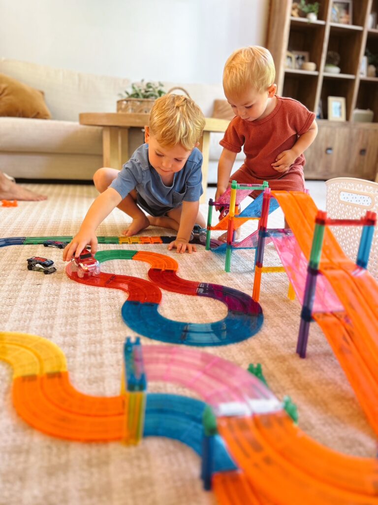 Educational Summer Activities for Toddlers: build ramps and roads with magnetic tiles